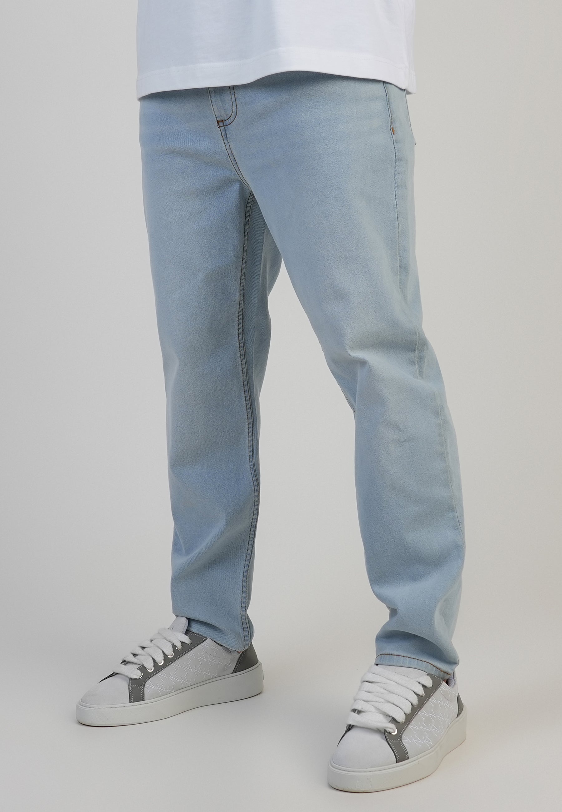 Tapered Fit Jeans in Washed Light Blue Jeans SikSilk