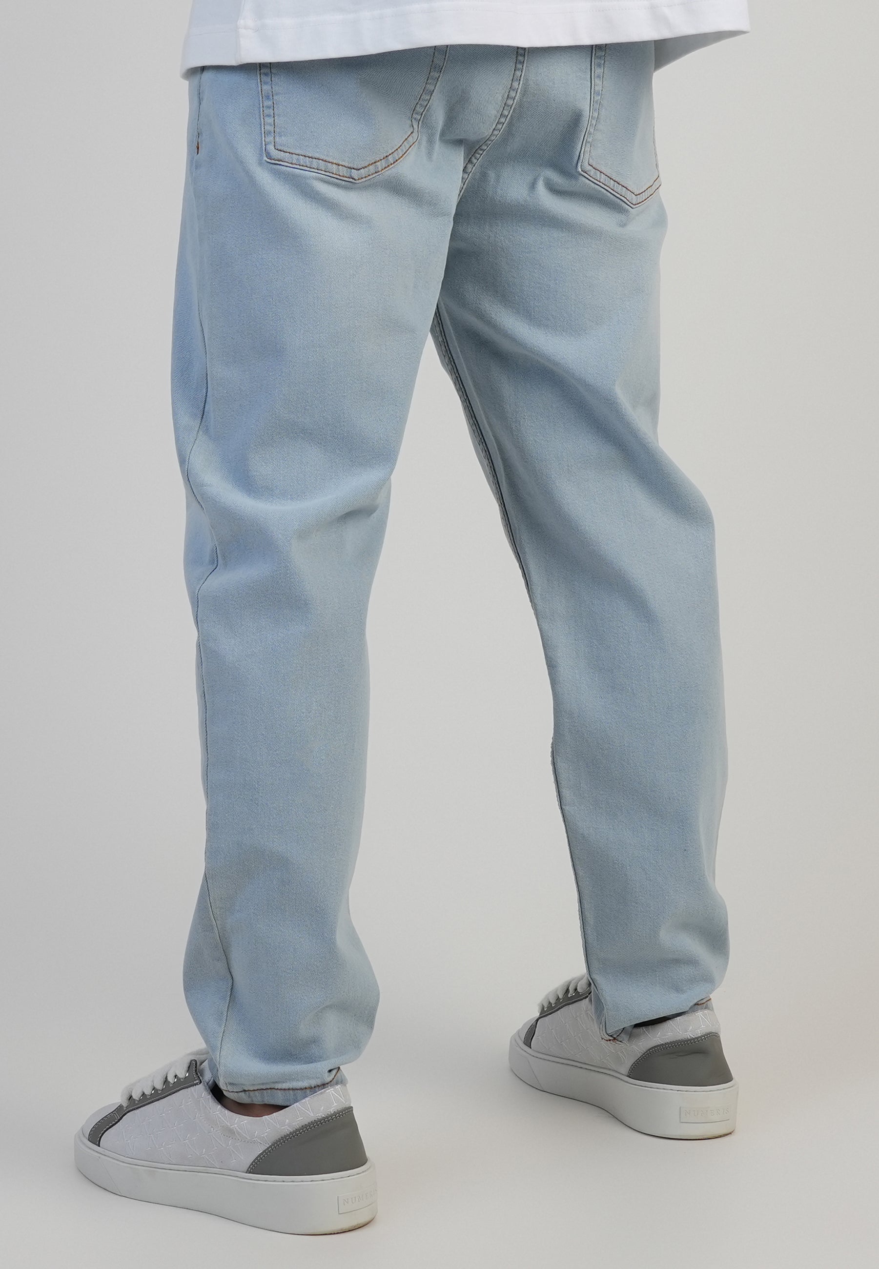Tapered Fit Jeans in Washed Light Blue Jeans SikSilk